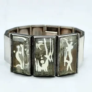 JEAN DESPRES (1889-1980) et ETIENNE COURNAULT (1891-1948) Bracelet articulé en argent