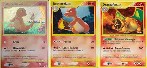 Salamèche (101/100), Reptincel (102/100), et Dracaufeu (103/100)