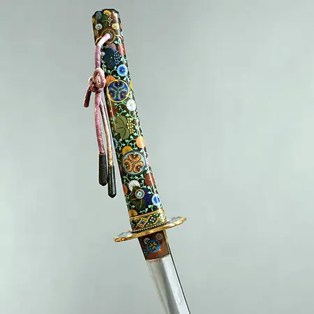 tsuka du katana : poignée. Son cœur est constitué de deux coques de bois de magnolia