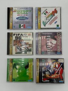 Lot de 6 jeux Sega Saturn édition japonaise comprenant : - Last Bronx X - Virtual Fighter CG Portrait Series Lion Rafale - Virtual Fighter CG Portrait Series Jeffry McWild - FIFA Soccer 96 - Victory Goal 96 - Victory Goal Complets et dans leurs boîtes d'origine