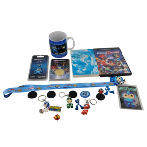 Lot rétrogaming lié à l'univers Megaman - Jeu : Megaman x Command Mission - Différents goodies : Manga, tasse, porte-clés, figurines. Jeu avec notice, boîte.