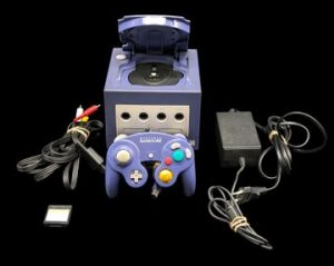 Nintendo - Console de salon - GameCube. Test d'allumage effectué avec succès. Avec cordon d'alimentation, câble vidéo, une manette officielle fonctionnelle, une carte mémoire.