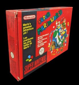 Nintendo - Super NES - Jeu Super Mario World. Avec boîte, notice, cale en plastique. Version du jeu FAH.