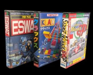 Sega - Mega Drive - Lot de 3 jeux : Eswat, Klax, Monaco GP. Avec boîtes, cartouches, 2 notices (1 manquante, voir photos), ainsi qu'un poster. Version des jeux en japonais.